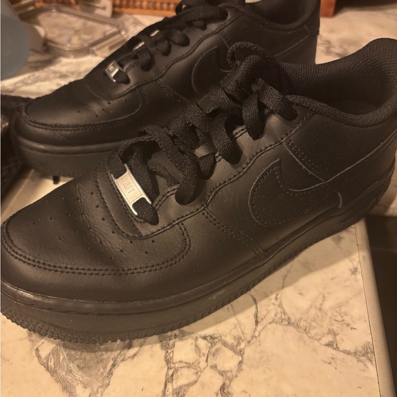 Nike All-Black Leather Sneakers